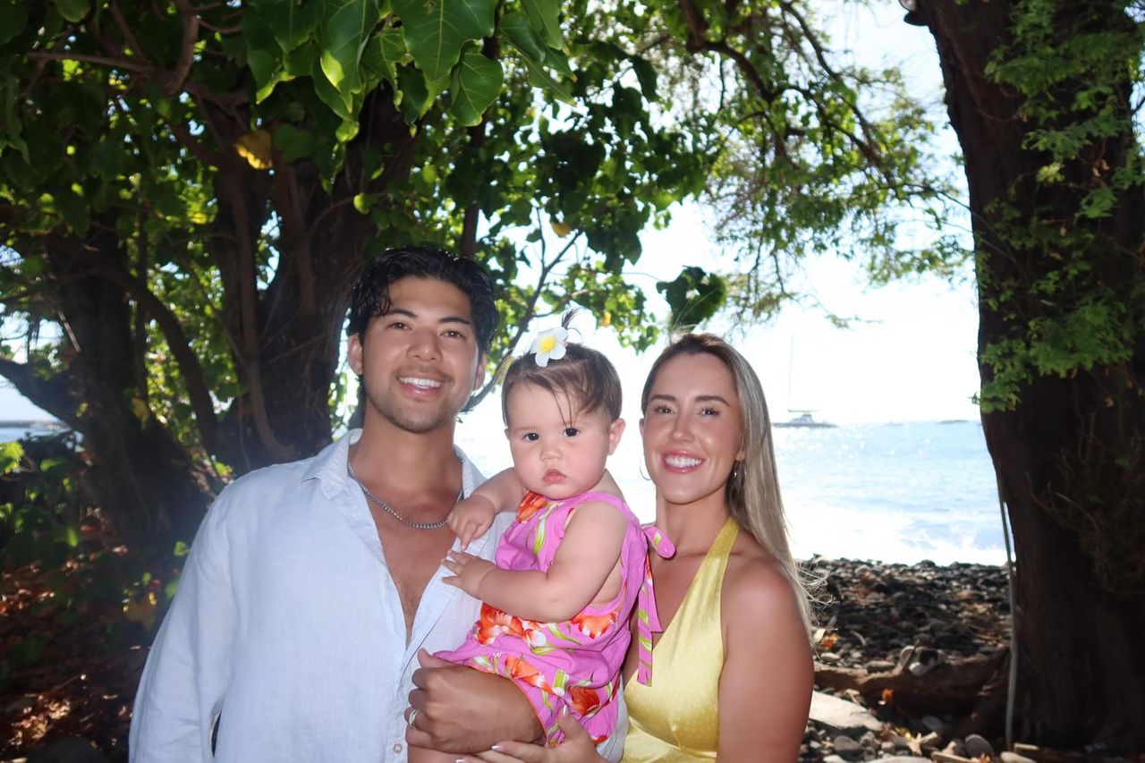 Reece Obligacion with his wife and daughter